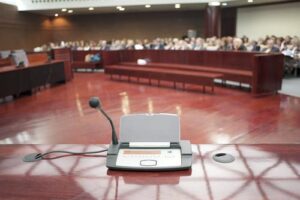 Settles Lawsuit to Avoid Public Testimony