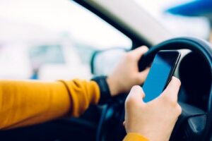Johns Creek Texting While Driving Accidents | John Foy & Associates Johns Creek Texting While Driving Accident Lawyer