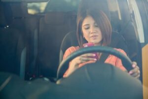 Stonecrest Texting While Driving Accident Lawyers | Car Accidents | John Foy & Associates Stonecrest Texting While Driving Accident Lawyer