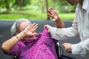 Savannah Nursing Home Abuse Lawyer | Get a Free Consultation Today A nurse threatens to hurt an elderly woman in a wheelchair.