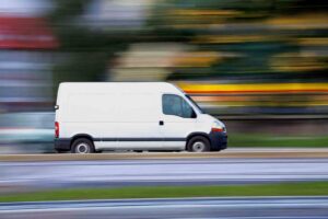Mableton Moving Van Accident Lawyers | Free Case Review | No Obligation A moving van drives fast down the open road.