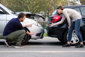 two motorists arguing fault after rear-end accident