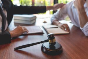 Hampton Personal Injury Lawyers | John Foy & Associates lawyer discussing claim with potential client