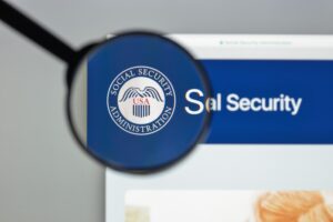 Hampton Social Security Disability (SSD) Lawyers | John Foy The SSA logo on a webpage under a magnifying glass.