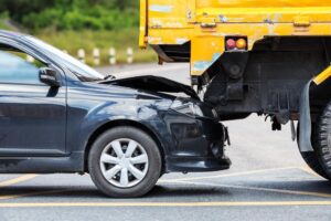 Truck Accident Lawyer in Lawrenceville | John Foy & Associates truck backed up into car