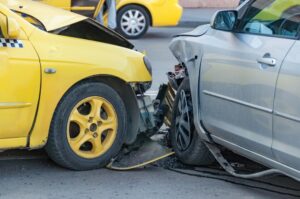 Columbus Taxicab Accident Lawyers | John Foy & Associates yellow taxi crashed into car