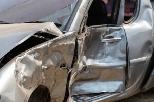 Ellenwood Car Accident Lawyers | John Foy & Associates A silver car T-boned on the driver’s side.