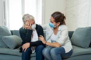Jonesboro, GA, Wrongful Death Lawyer | John Foy & Associates daughter comforts grieving mother