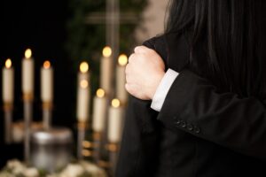 Wrongful Death Lawyer in Acworth, GA | John Foy & Associates family member comforts grieving woman