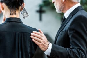 Wrongful Death Lawyer in Decatur, GA | John Foy & Associates family grieves at funeral