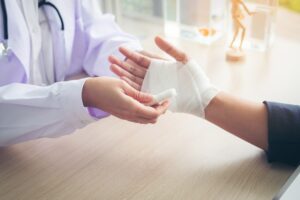 Burn Injury Lawyer in Macon | Free Consultations burn victim with bandaged hand