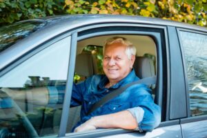 Uber Accident Lawyer in Mableton | 24/7 Support happy senior man working for uber