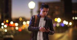 Athens Lyft Accident Lawyers | John Foy & Associates man waiting on rideshare pickup
