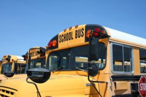 Albany Bus Accident Lawyers | John Foy & Associates school bus lot
