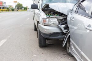 Rear-End Collision Lawyer in Newnan | Free Consultation silver car crashed into the back of another