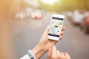 Rideshare Accident Lawyer in Lithonia | 24/7 Help woman using rideshare app