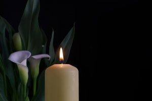 candle with lilies