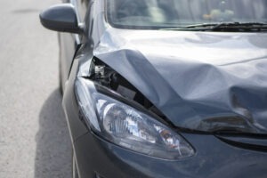 In An Uber Accident? | Hire a Lawyer in Jonesboro, GA bent-up car hood