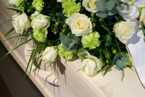 Rome Wrongful Death Lawyers | 24/7 Help Available flowers on a casket