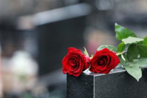 roses on tombstone