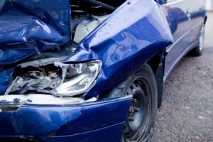 Union City Rideshare Accident Lawyers | Get Legal Help smashed-up blue car
