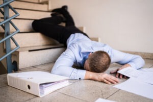 office worker fallen down stairs