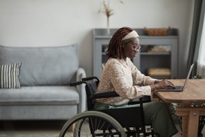 woman in wheelchair working