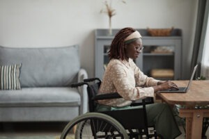 Catastrophic Injury Lawyer in Brunswick | 24/7 Help woman in wheelchair working