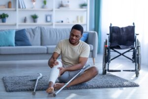 Catastrophic Injuries Lawyer in Canton | Free Consults black man with a leg in a cast
