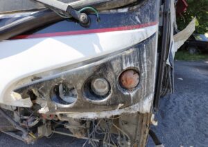 Bus Accident Lawyer in Calhoun | Free Consults crushed bus headlight