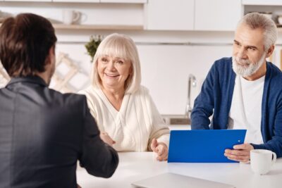 Happy clients talking to their lawyer