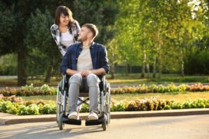 Catastrophic Injuries Lawyers in Clarkston | Free Evals woman pushing man in a wheelchair