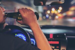 Drunk Driving Accident Lawyer in LaGrange | Free Eval man drinking while driving