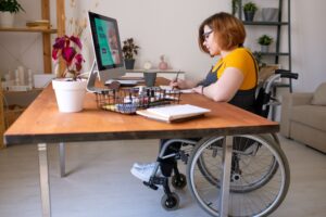 Catastrophic Injuries Lawyer in Hinesville | Free Eval office worker in wheelchair