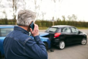 man calling for help after rear-end crash