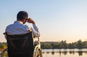 Catastrophic Injury Lawyer in Monroe | Free Consults man working outside in a wheelchair