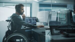 Catastrophic Injury Lawyers in Peachtree Corners | John Foy & Associates male worker in wheelchair