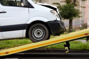 Truck Accident Lawyer in Sugar Hill | Free Consultation crashed truck being loaded on a tow truck