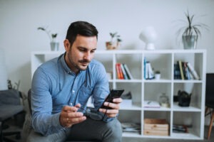 man checking his incoming calls