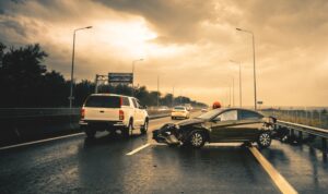 Highway Accident Lawyer in Augusta | John Foy & Associates crash on rainy highway