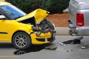 front of car gets damaged by crash