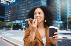 woman with a coffee on the phone