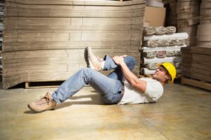 Georgia Target warehouse worker lies on grounds and holds leg after accident