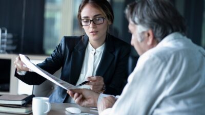Lawyer working with client