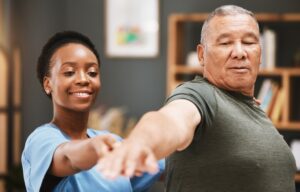 Man is evaluated by physical therapist during FCE test