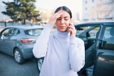 A personal injury victim calls her lawyer and asks, “How long do you have to report a car accident?” at the scene of the collision.