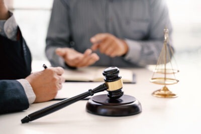 Lawyer meets with client to explain average Sterigenics lawsuit settlement amounts.
