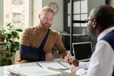 How to Negotiate a Slip and Fall Accident Settlement Lawyer meets with client to explain how they’ll negotiate a slip and fall accident settlement