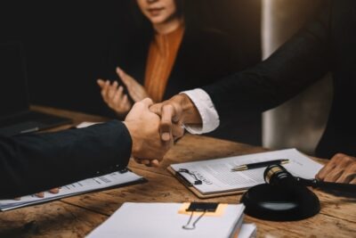 How Much Is the Average Settlement Offer During Mediation? Attorneys shaking hands after discussing an agreement. What is the average settlement offer during mediation?