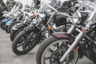 What to Do if You’re Hurt at the Milledgeville Thunder Rally Motorcycles parked in a row, with nearby riders planning to attend the Milledgeville Thunder Rally but worried about what they should do if they get injured at the event
